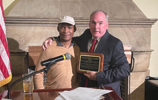 Chris on the podium with Keletso Tebogo